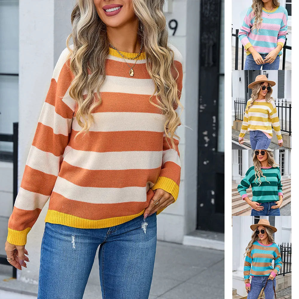 Women's loose fit acrylic knit sweater in blue with striped pattern, long sleeves and round neck.