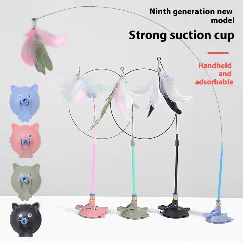 Plastic cat teasing wand with suction cup base, long handle, bell attachment, and feather teaser in various colour options