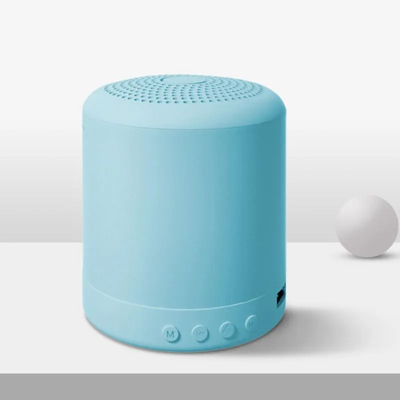 Small square A11 wireless subwoofer stereo speaker in black, pink, blue, or green colour.