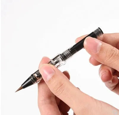 Ten steel ink sacs for fountain pen repair laid out on a surface.