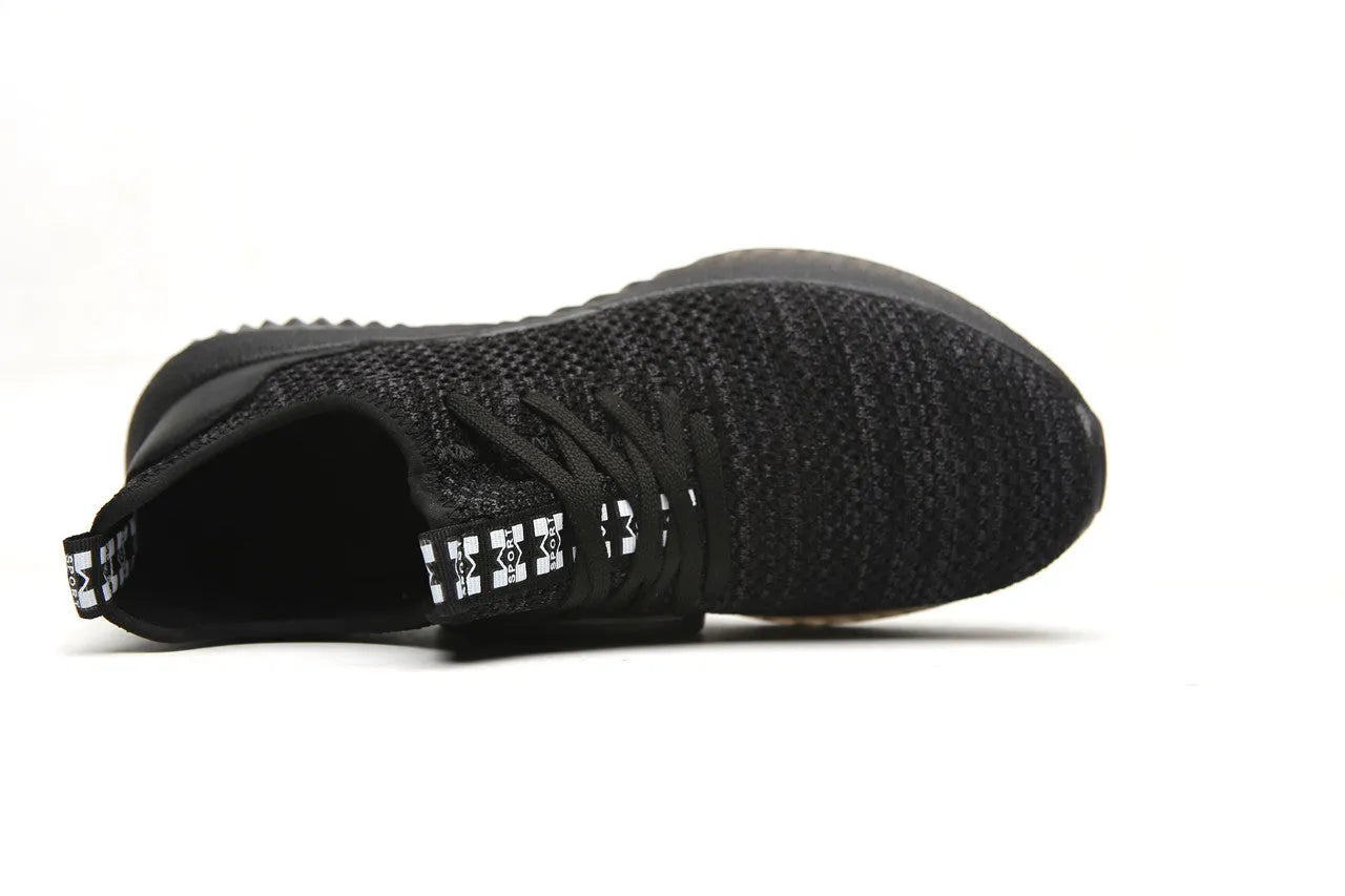 Men's black safety work shoes with steel toe cap and EVA sole on a grey background.