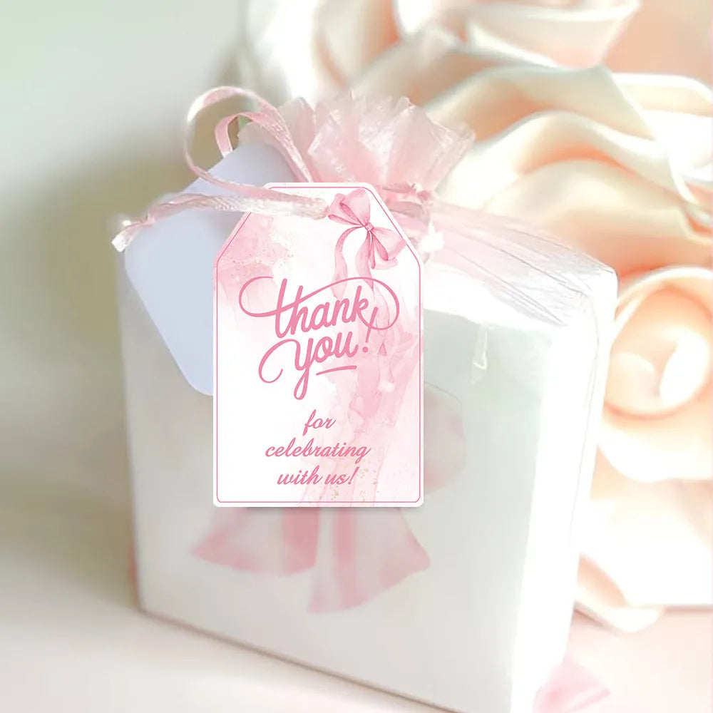 Three styles of birthday party gift tags with bowknot designs and hemp rope ties