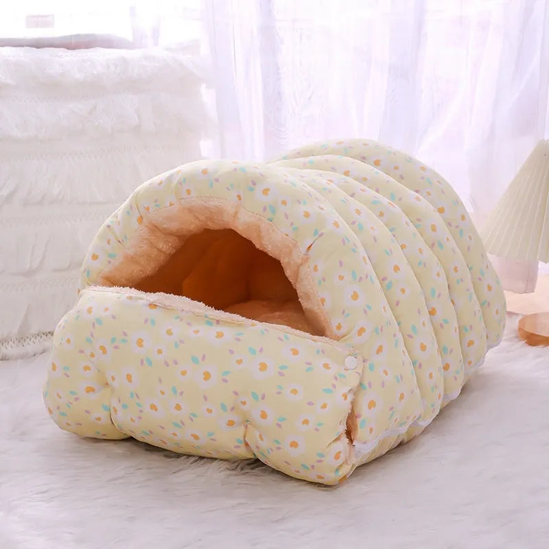 Enclosed winter cat bed with a removable cover in a floral pattern, shown in small and medium sizes.