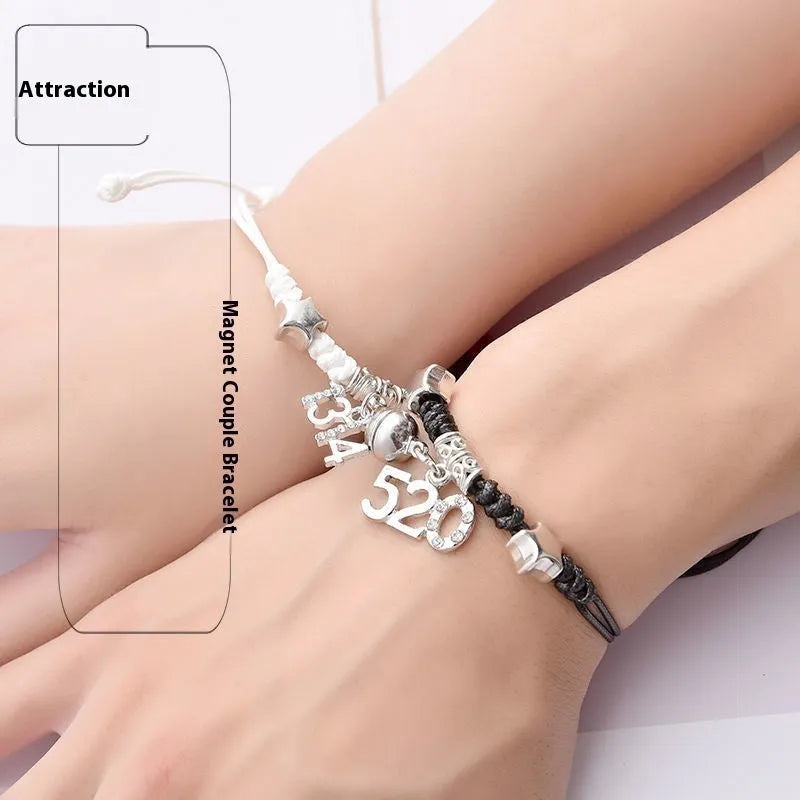 Couple suction bracelet pair showing electroplated alloy construction with crown pendant design