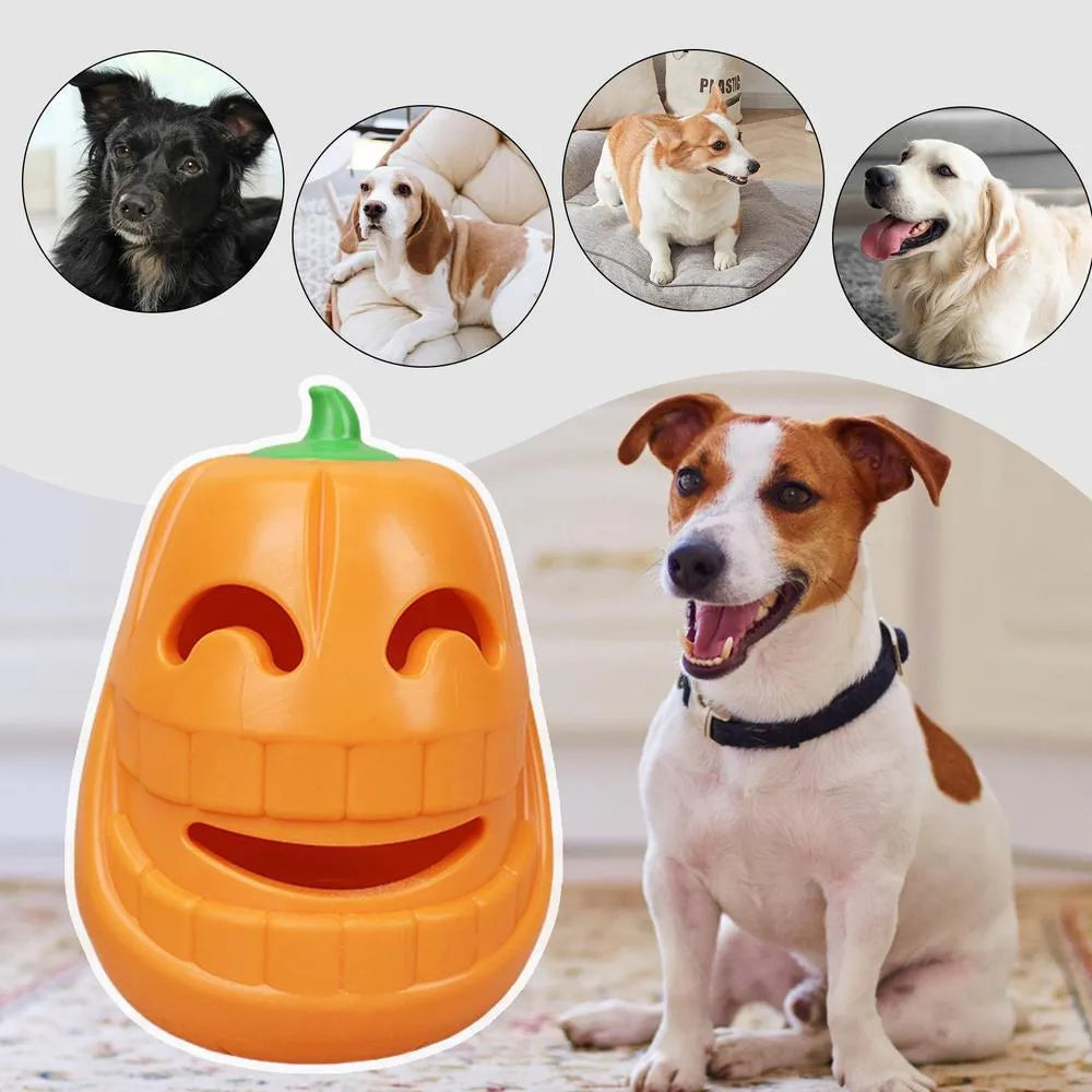 Yellow pumpkin-shaped TPR dog chew toy for aggressive chewers on a white background.