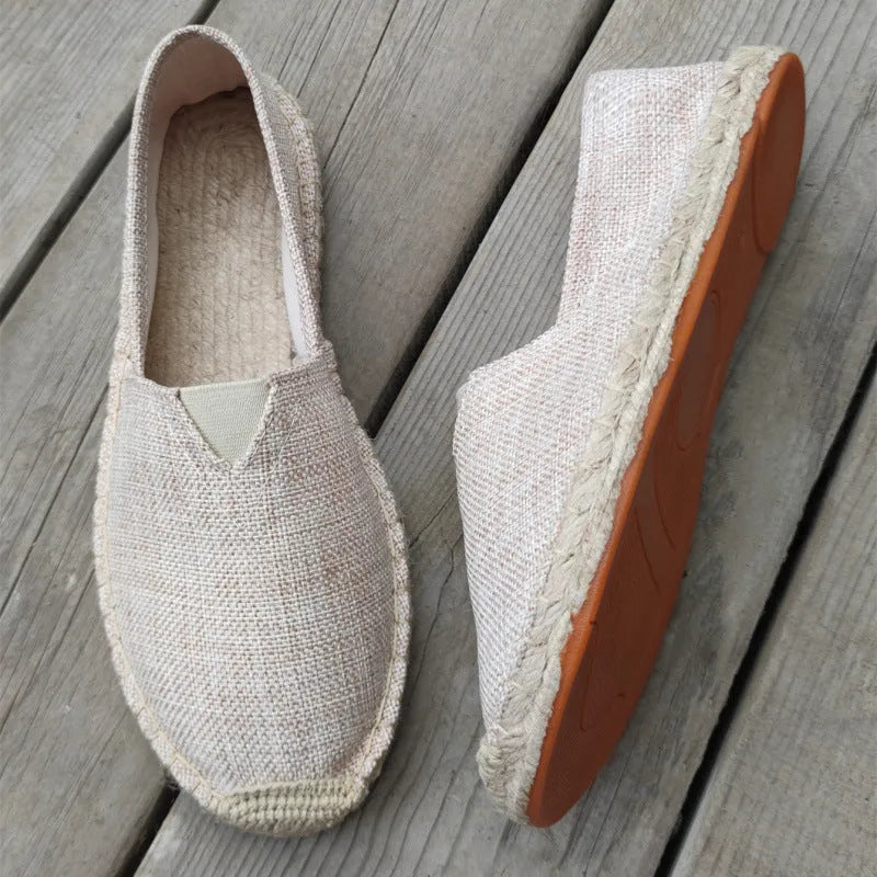 Men's solid colour canvas casual shoes with round toe in multiple size options.