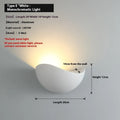 Black bird's nest design outdoor waterproof LED wall lamp with IP65 rating mounted on a wall.