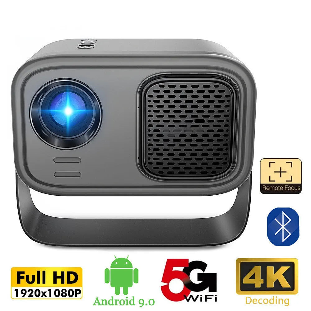 Black compact HD smart portable projector with remote control on a table.