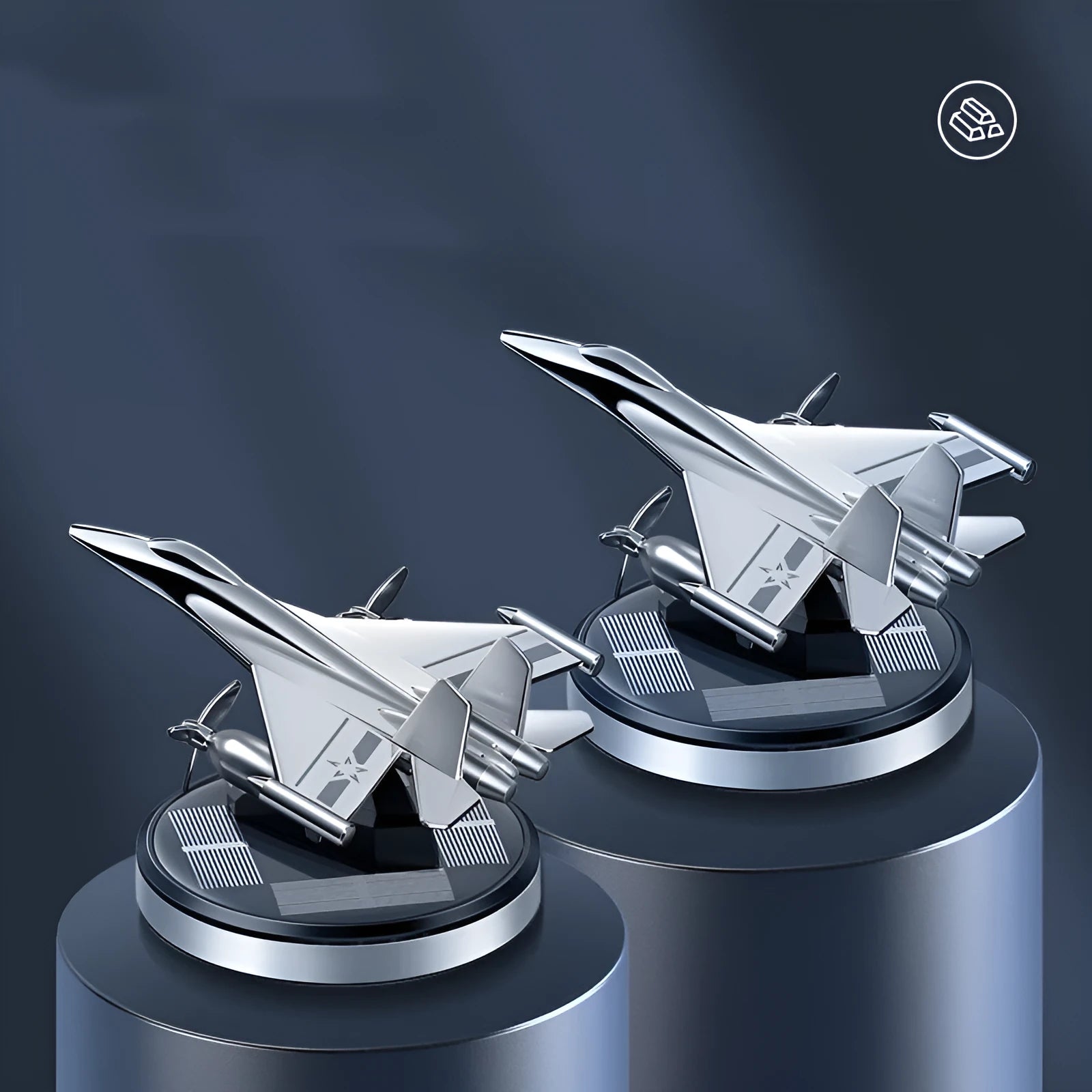 Silver solar powered rotating fighter jet perfume ornament on a car dashboard.