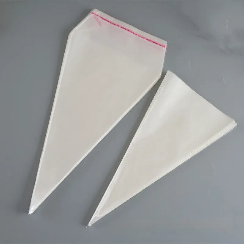 Clear triangle plastic packaging bag with a twisted wire tie closure on a white background.