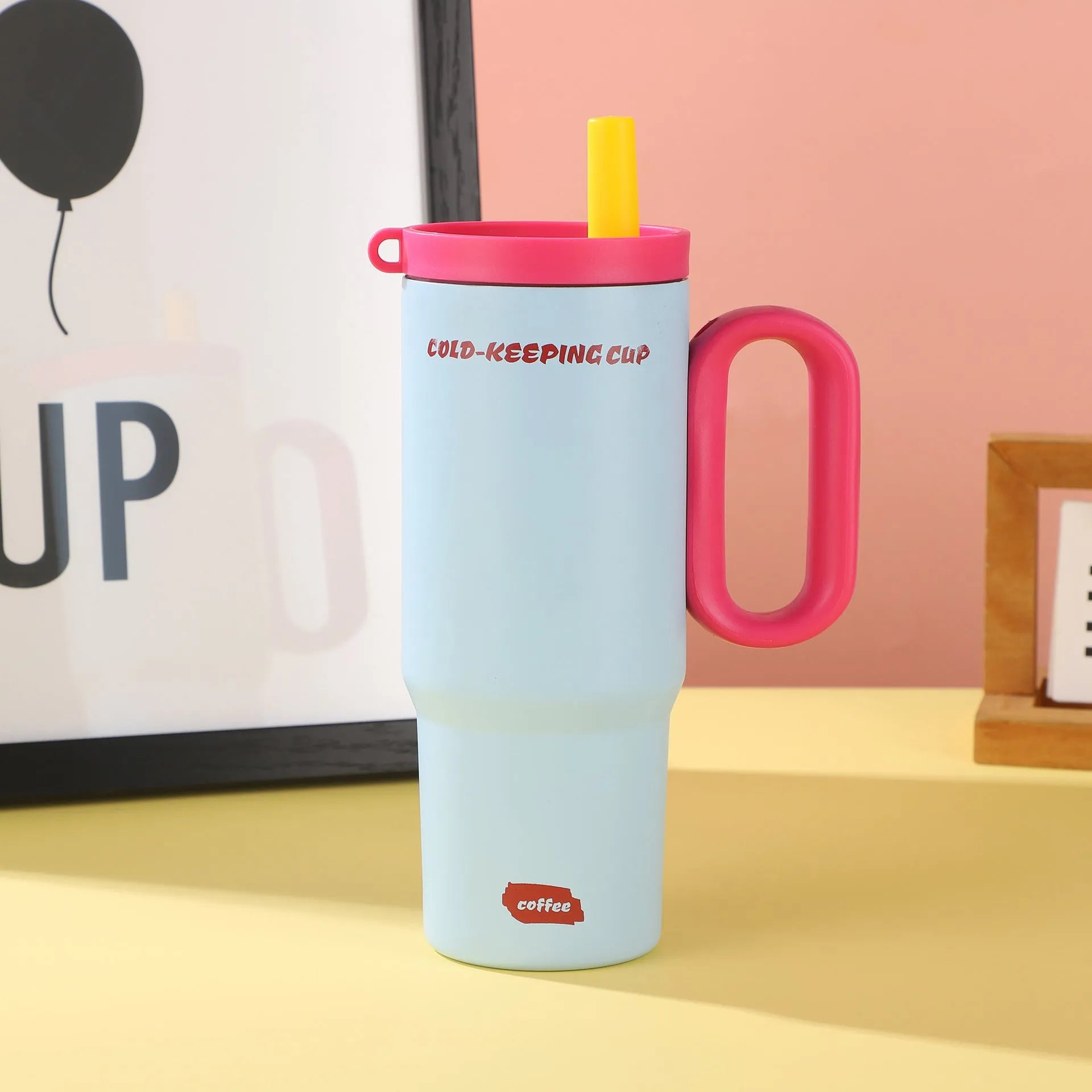 Large 700ml straw cup with a carry handle in assorted colours.