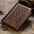 Embossed faux leather A5 notepad with textured three-dimensional cover in bronze colour option