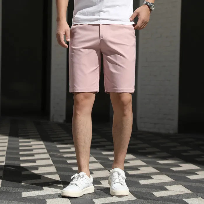 Men's elastic waist fifth pants in polyester fabric showing mid-length design and solid colour options