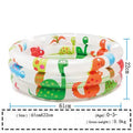 INTEX inflatable baby pool with dinosaur and volcano print, 61cm round, deflated on grass