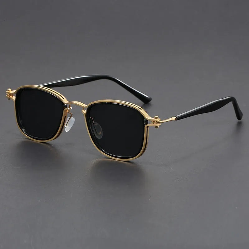 Retro square frame sunglasses with AC lenses in a Black Gold Full Gray colour finish.