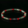 Men's bohemian bracelet with cylindrical semi-precious stone beads on a hand-woven cord.