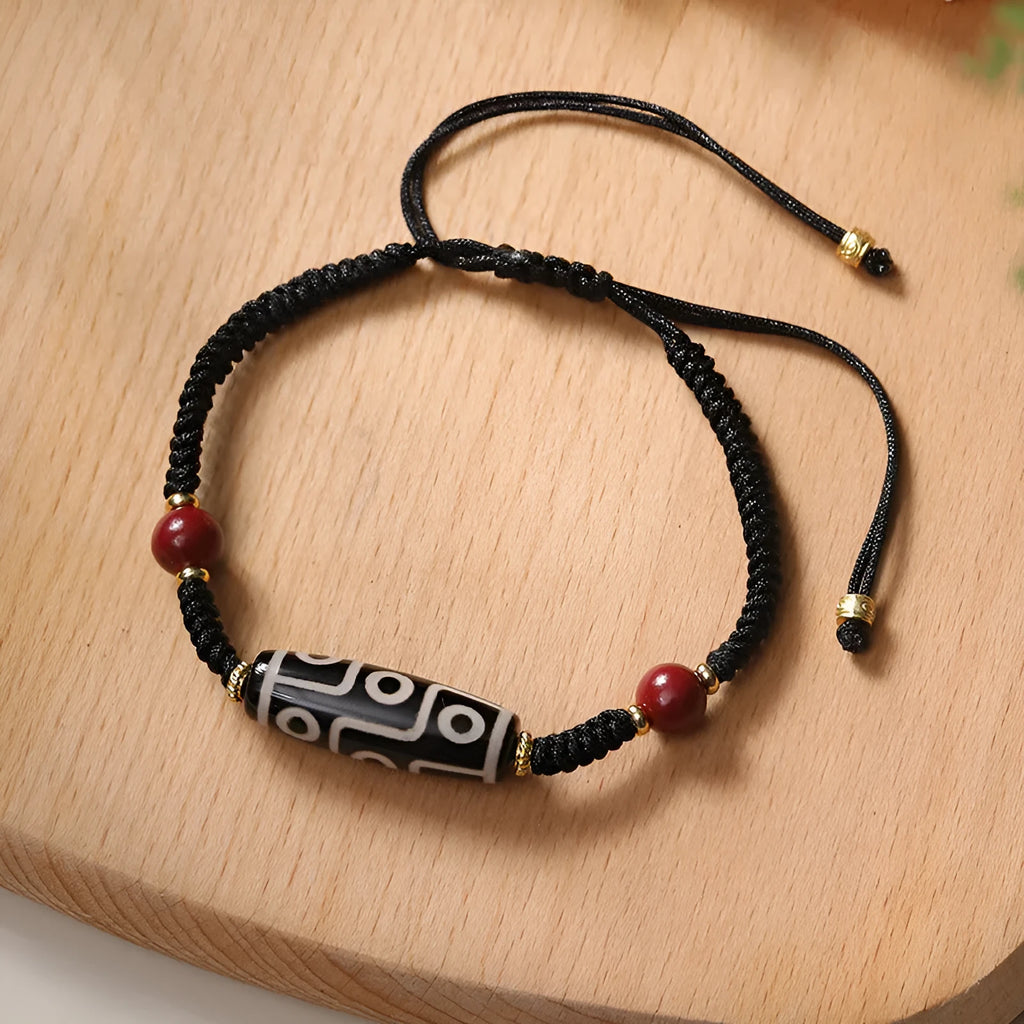 Tibetan agate dzi bead bracelet with adjustable shrinkable fit showing natural stone beads