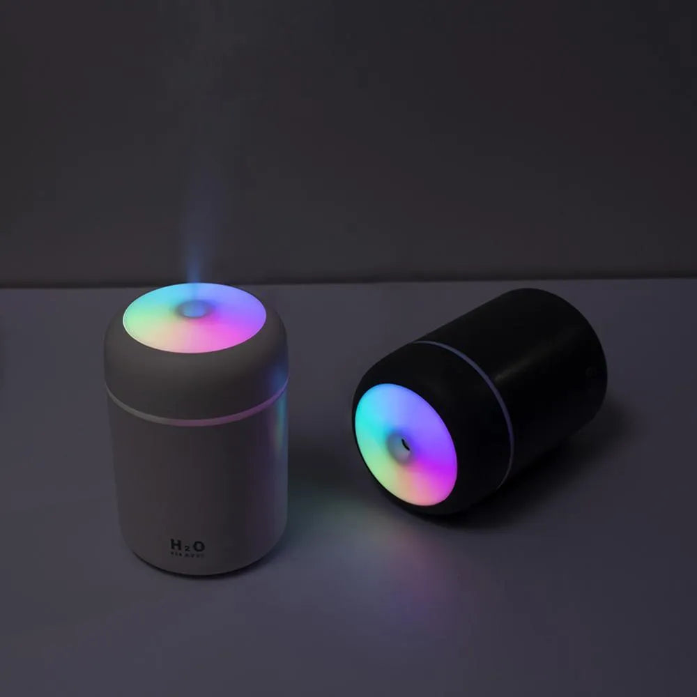 Pink USB desktop humidifier with LED lights and 300ml water tank