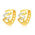Gold geometric hollow out alloy earrings with ear clip fastening shown from front angle