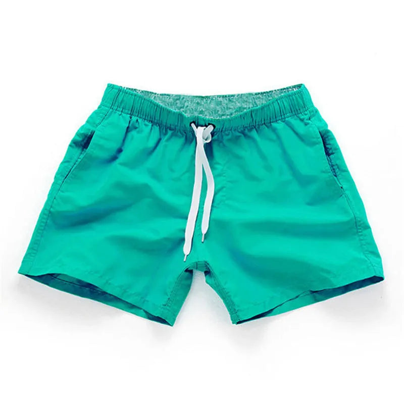 Men's straight leg polyester beach shorts in multiple colour options