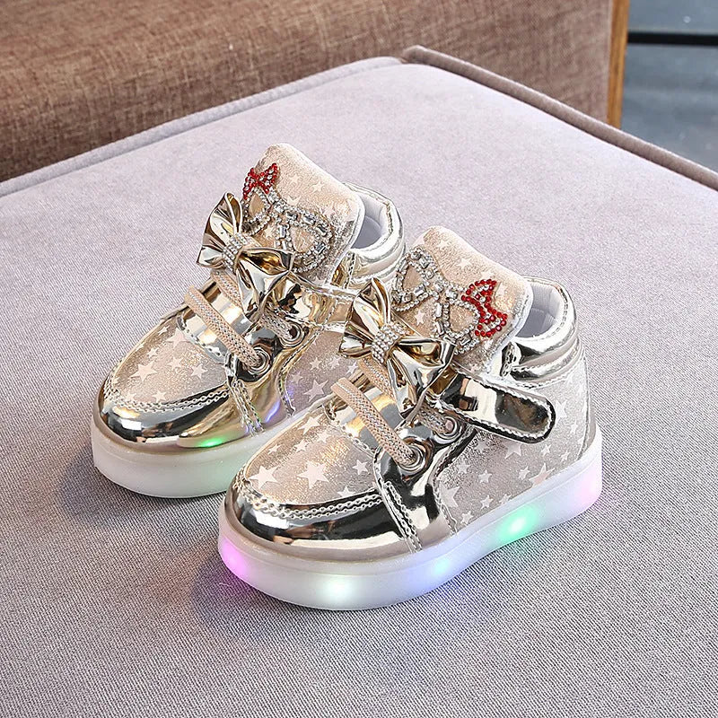 LED children's trainers with magic button switch showing colour changing lights and flashing heel illumination