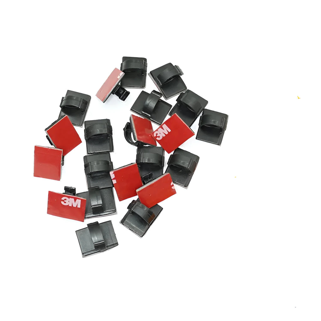 Black and white self-adhesive plastic buckle clamps for organising flat automotive wiring cables
