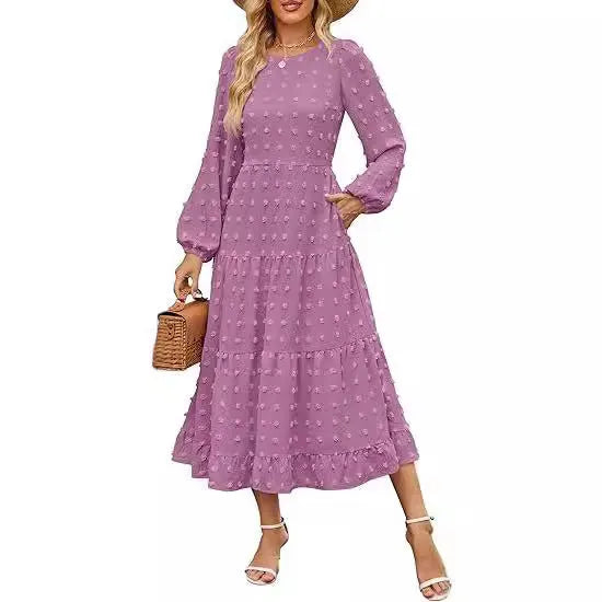 Women's long sleeve high waist dress with ruffled sleeves in a solid colour.