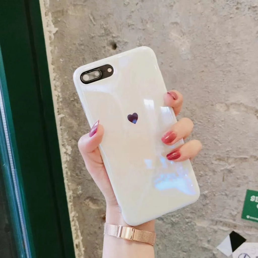 Simple bluwhite iPhone back cover case with blue light filter on an iPhone X