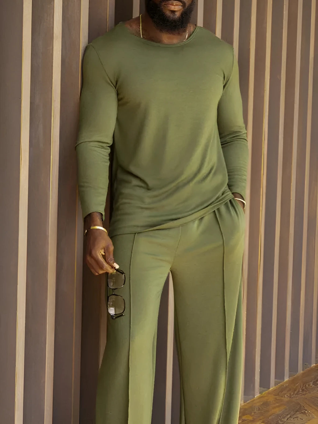 Men's green casual polyester two-piece set with long sleeve top and full-length trousers