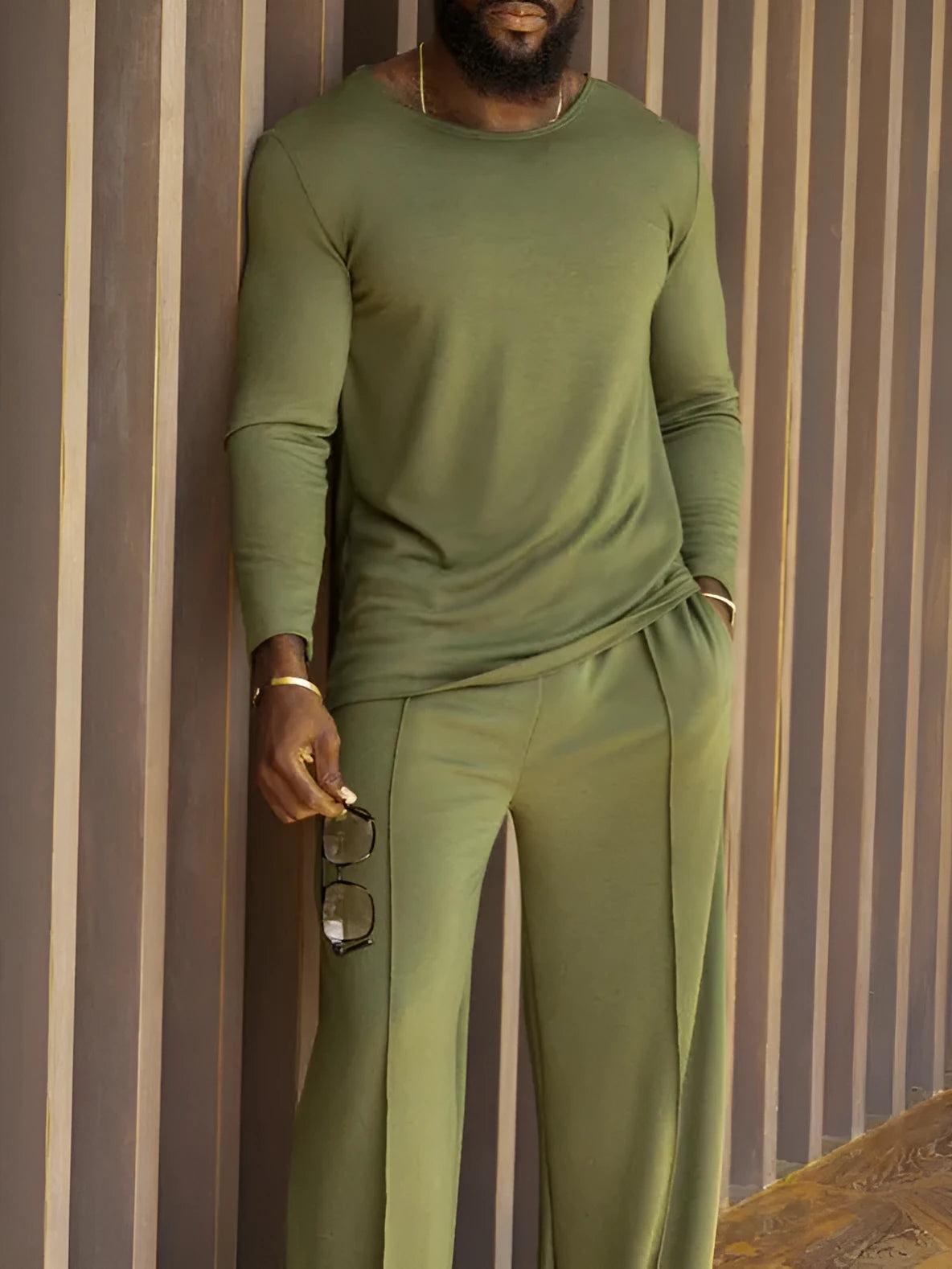 Men's green casual polyester two-piece set with long sleeve top and full-length trousers