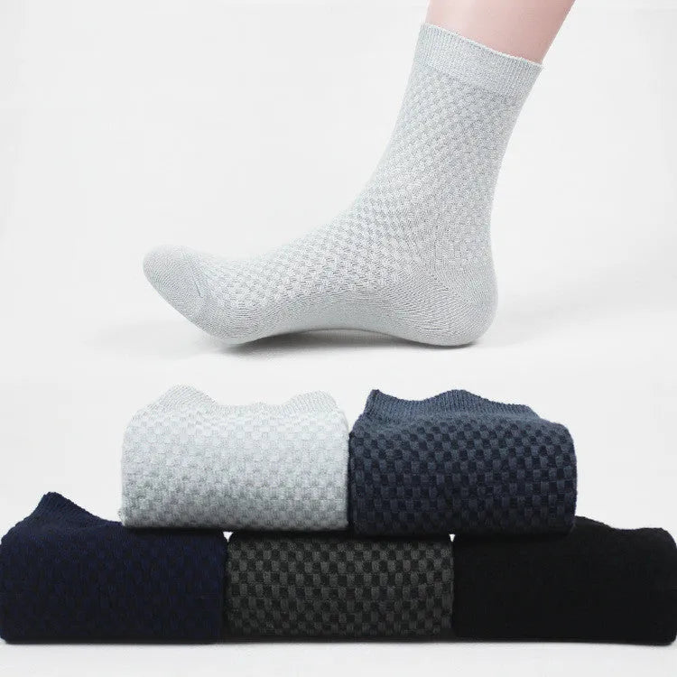A pair of men's bamboo fibre socks in a classic colour, showing the small square pattern and medium thickness.