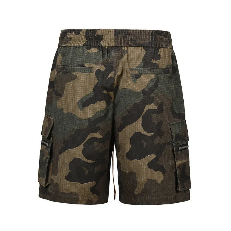 Men's green washed camouflage cotton cargo work shorts with multiple pockets on a mid-waist loose fit.