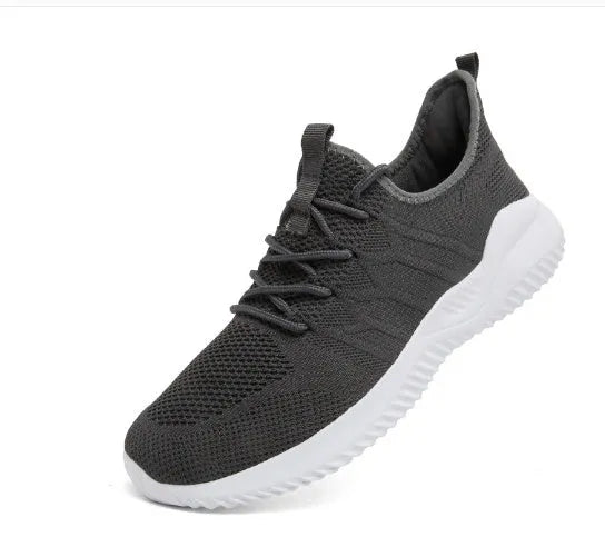 Men's black and white casual sports shoes with mesh upper and round toe design for jogging
