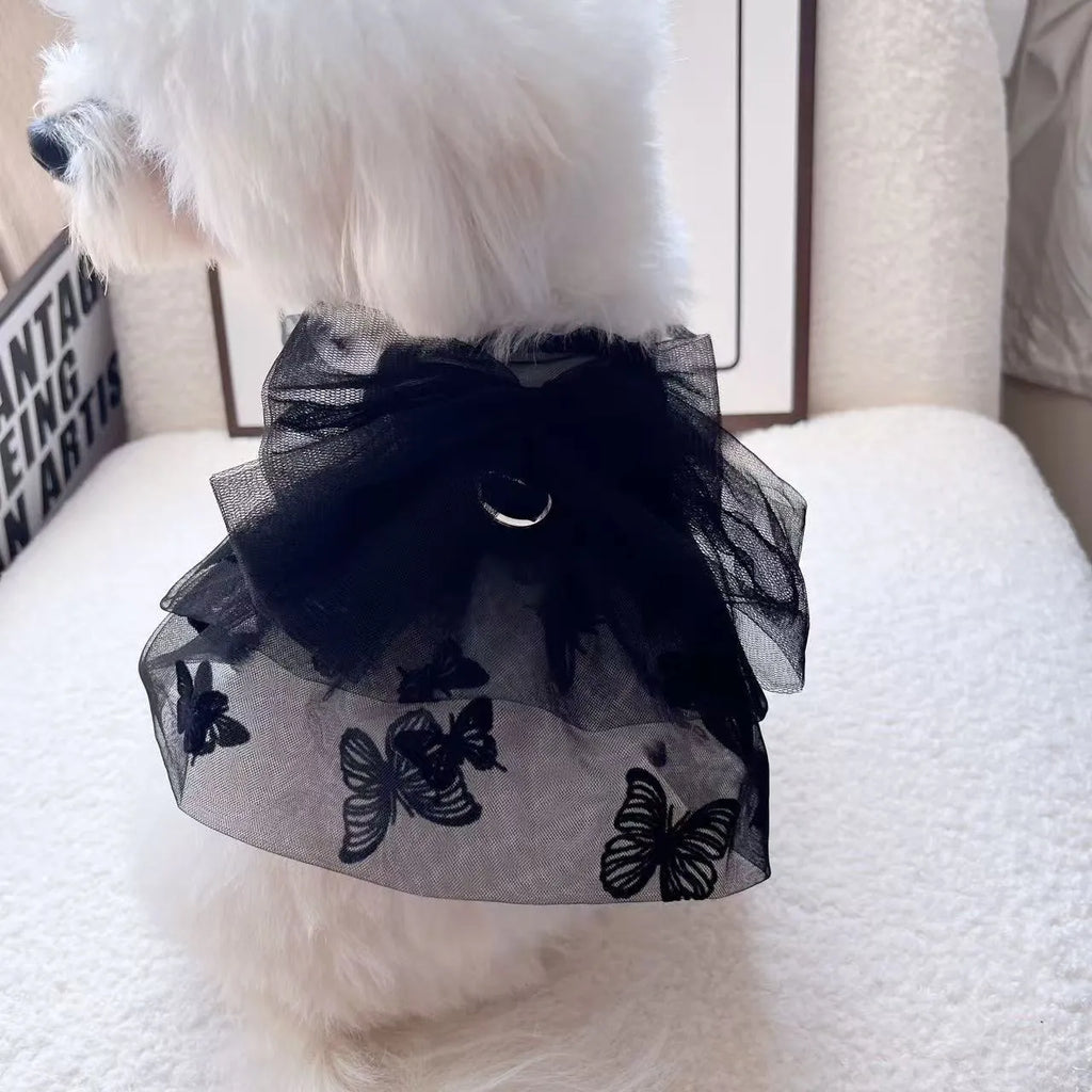 Black gauze tulle princess skirt costume on a small dog, showing the layered skirt and fitted bodice.
