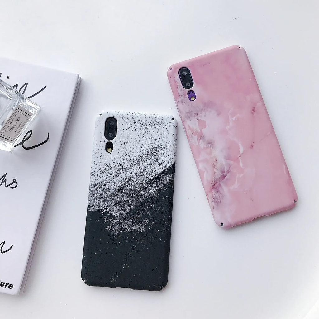Black painted hard back phone case for Huawei models on a white background.