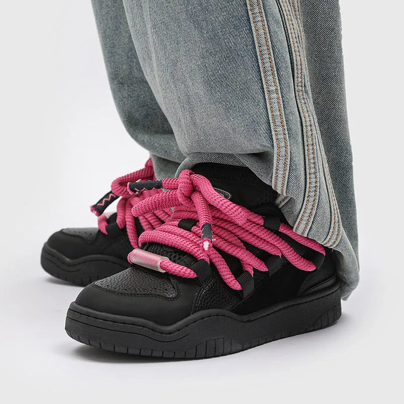 Unisex casual shoes with thick flat rubber sole and lace-up front in four colour options