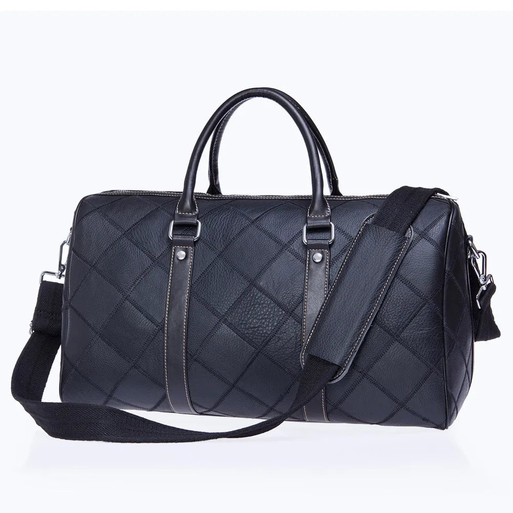 Vintage brown leather men's duffel bag with a single shoulder strap, shown open to reveal internal phone and ID pockets.