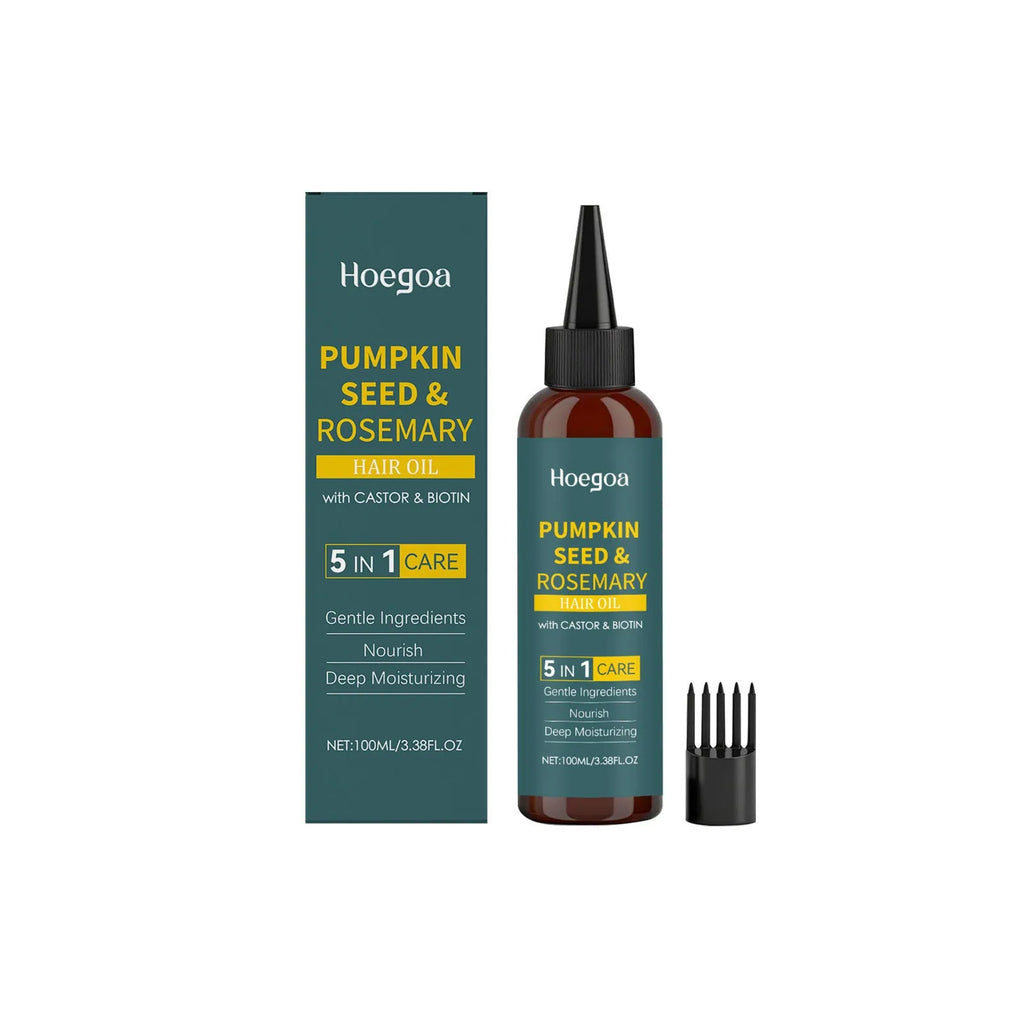 Rosemary essential oil bottle with pointed applicator nozzle and hair comb for hair care