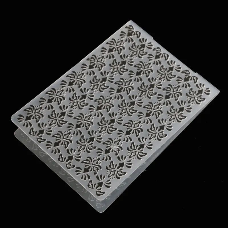 Plastic cake decorating mould with windmill design measuring 14.5 by 10.5 centimetres