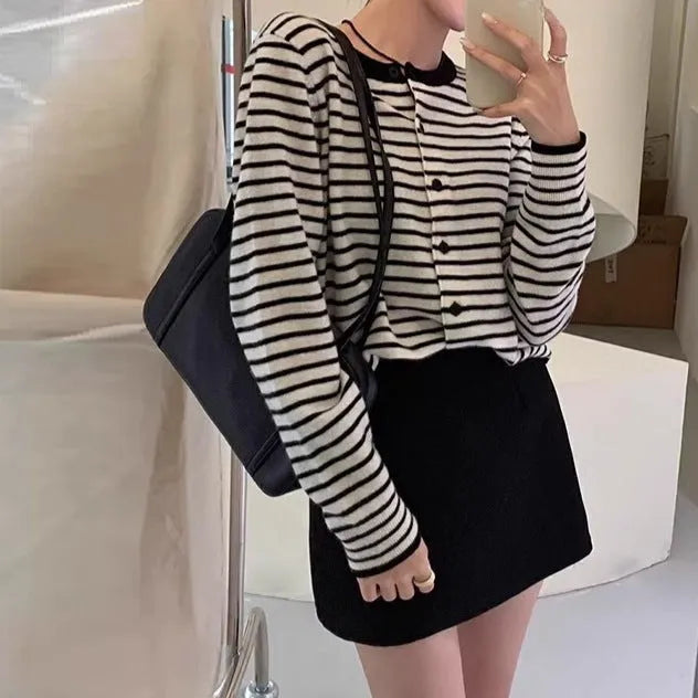 Dark grey and white striped women's cardigan coat with long sleeves and a slim, cropped fit.