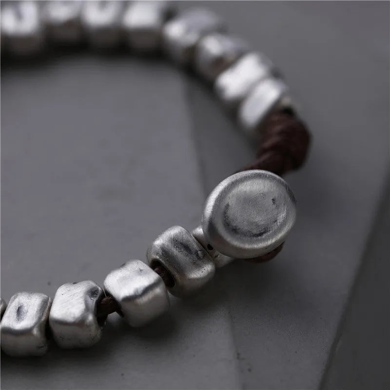 Handmade wooden women's bracelet with silver-coloured irregular square design on elastic band