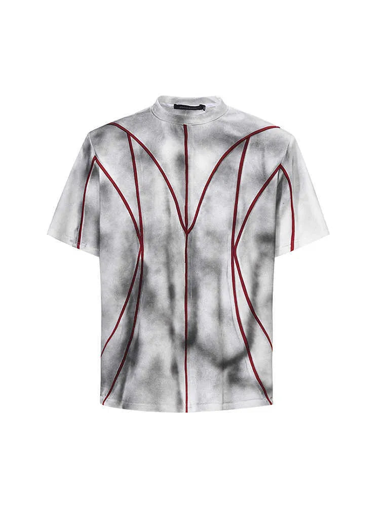 Short sleeve T-shirt with padded shoulders and three-dimensional line patchwork detail on a round neck