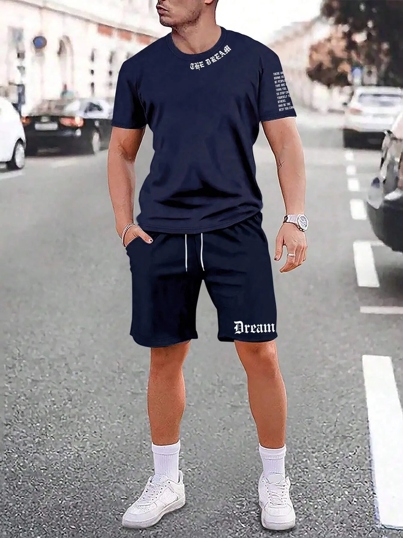 Men's blue printed short sleeve top and matching shorts sports set laid flat
