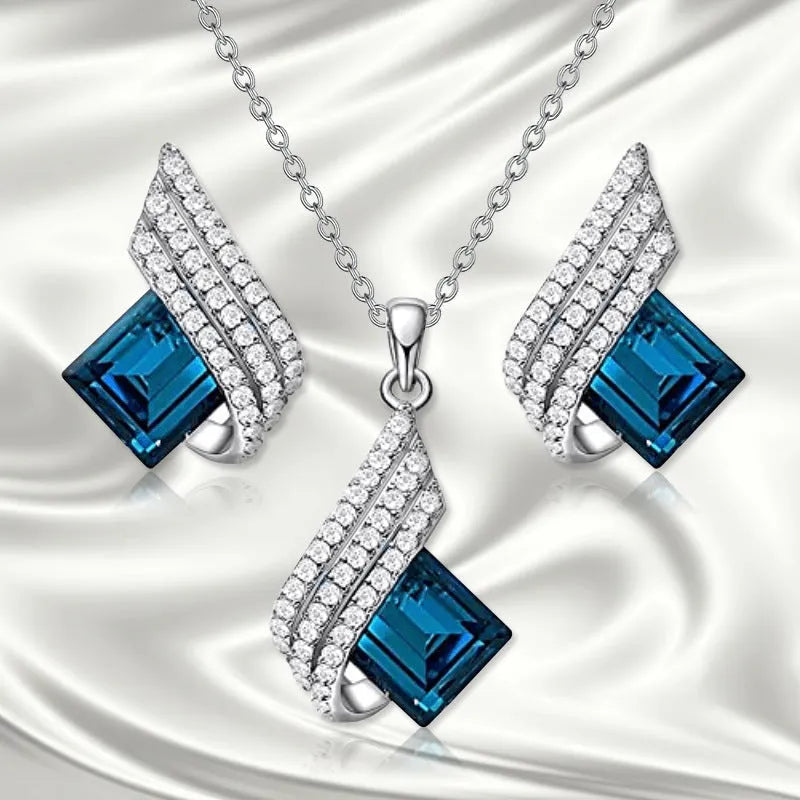 Glass pendant necklace with alloy cross chain and matching electroplated ear studs jewellery set