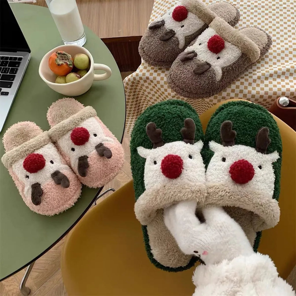 Women's Christmas deer design plush slippers with non-slip PVC soles in green, pink, and brown colours