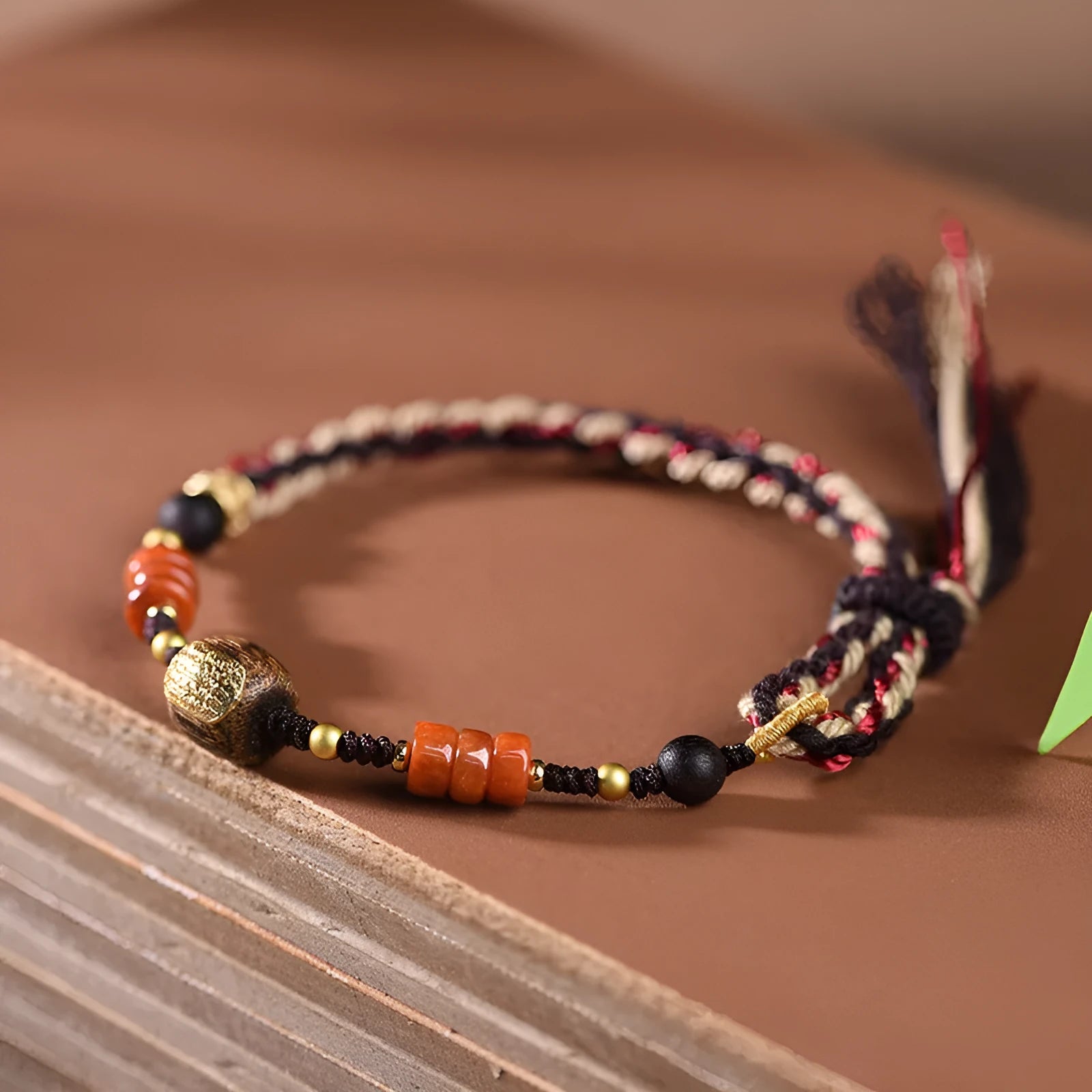 Hand woven DIY watch bracelet with lapis lazuli coloured rope and flexible wire in an ethnic style.
