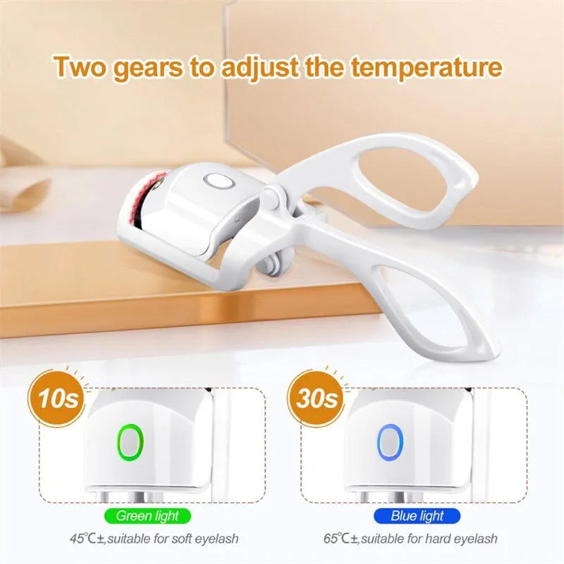 White USB rechargeable heated eyelash curler with dual temperature buttons and compact design.