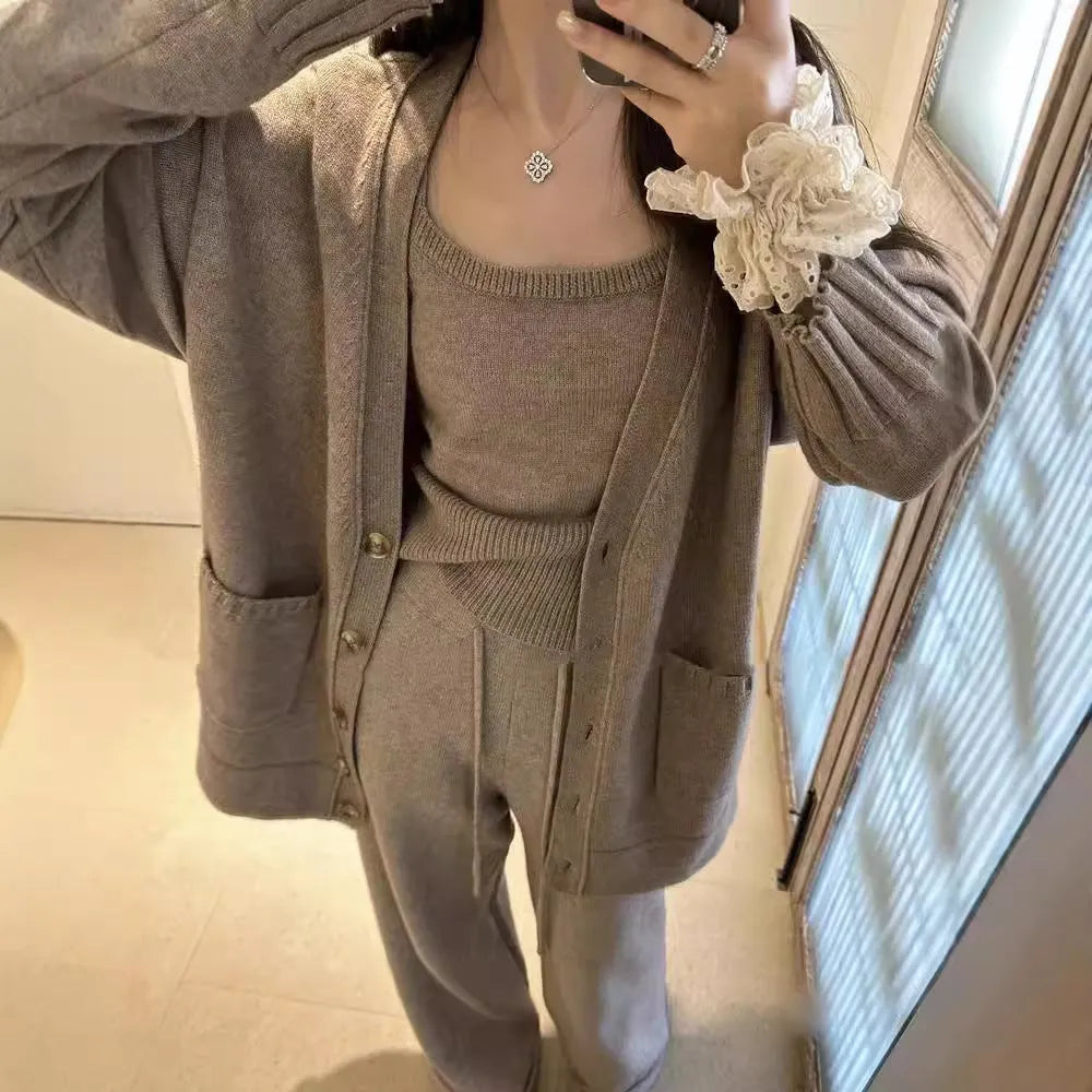 Women's light brown wool blend knit cardigan, vest, and loose pants three-piece casual set.