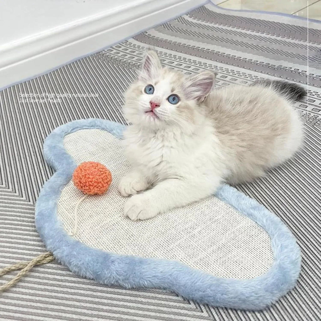 White wall mounted cat scratching mat with sleeping cat cartoon design on natural sisal.