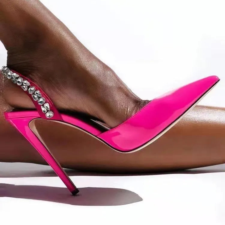 Women's black pointed toe high heel sandals with rhinestone side accents showing 11cm heel height
